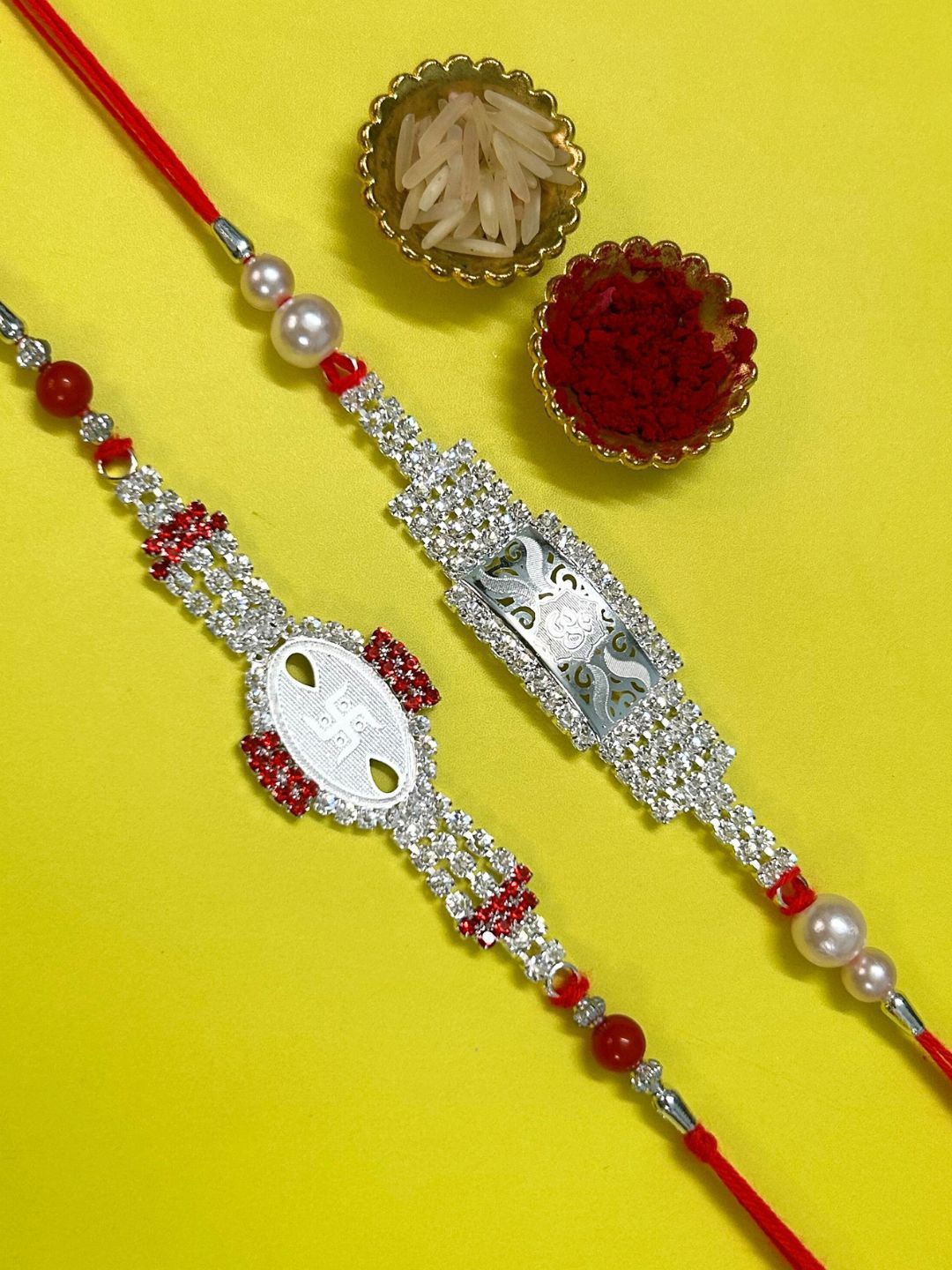 

LAIDA Set Of 2 Swastik & Om AD Studded & Beaded Thread Rakhis With Roli Chawal, Silver