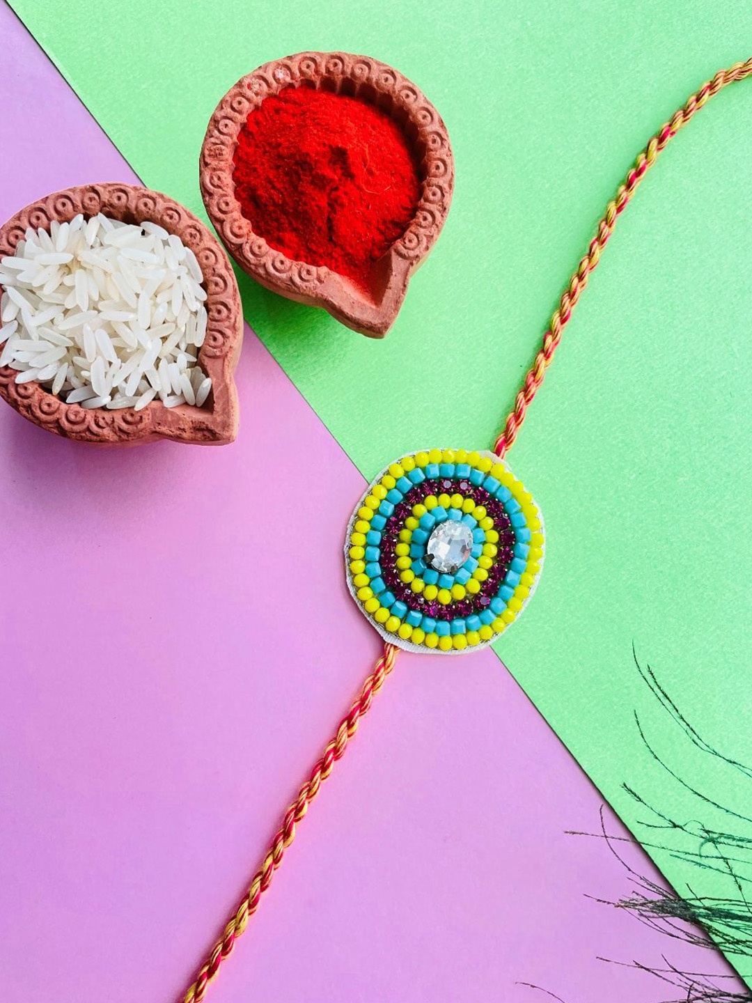 

Crunchy Fashion Beaded Thread Rakhi, Blue