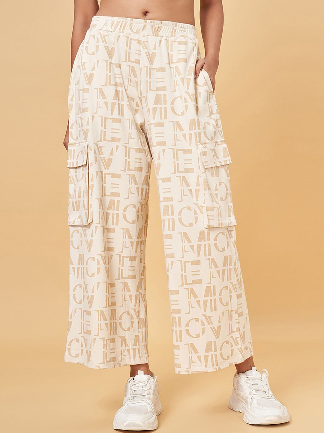 

Ajile by Pantaloons Alphanumeric Women Printed Track Pants, Off white