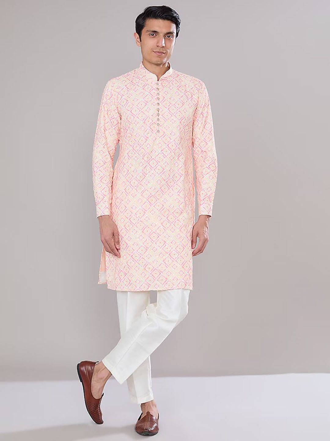 

RNG Safawala Ikat Printed Regular Sequinned Raw Silk Kurta With Pyjamas, Pink