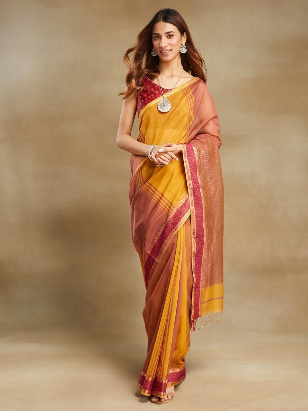 

Fabindia Colourblocked Zari Silk Cotton Maheshwari Ochre Saree, Yellow