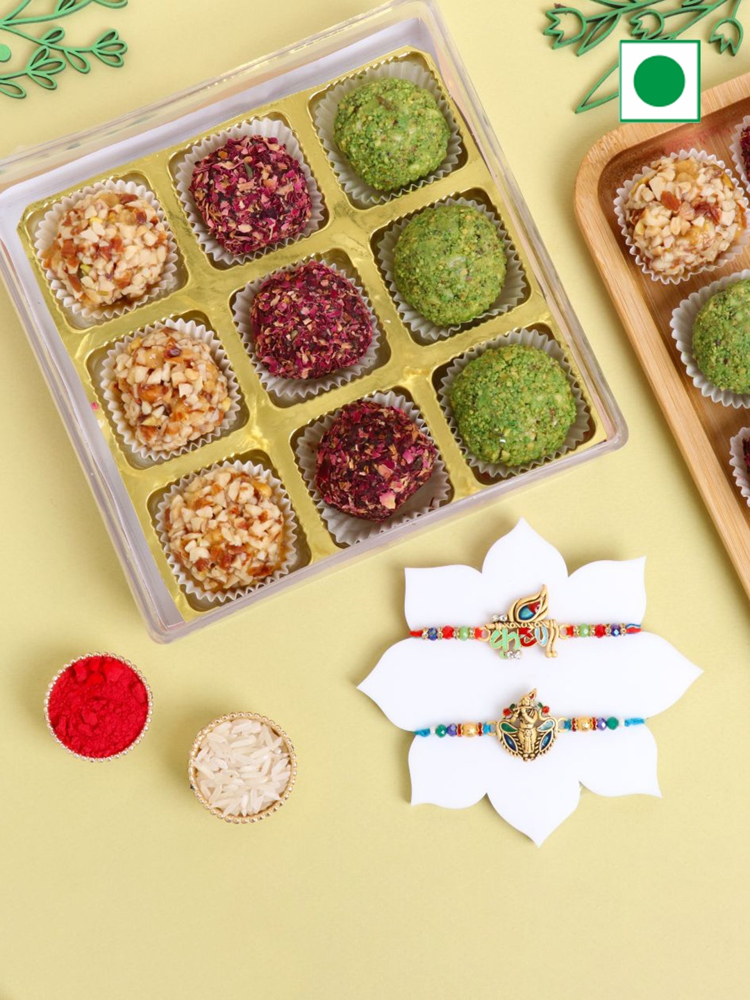 

Floweraura Set Of 2 Rakhis With 9Piece Mix Dryfruits Laddoo, Multi