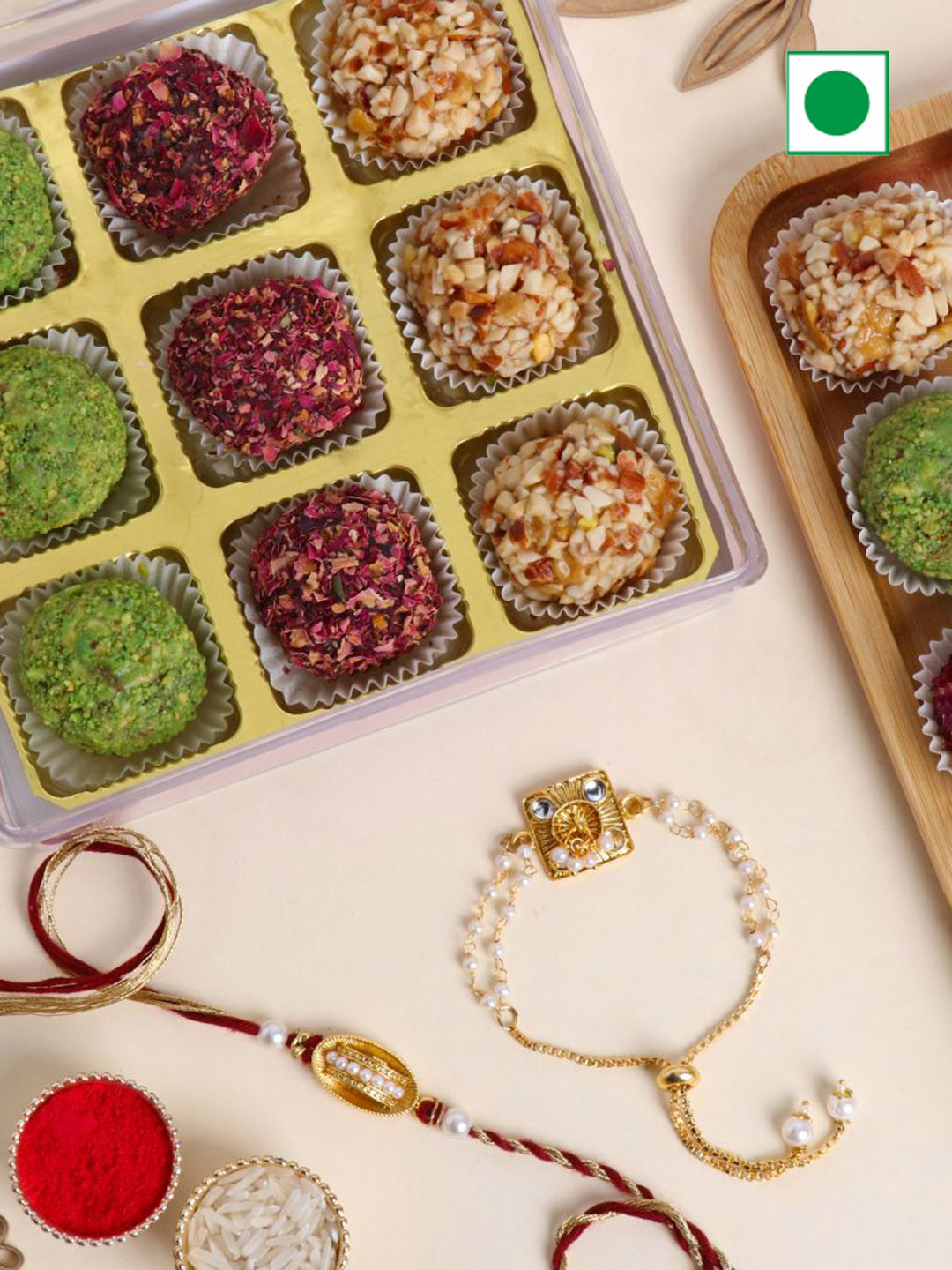

Floweraura Set Of 2 Rakhis With 9Piece Mix Dryfruits Laddoo, Multi