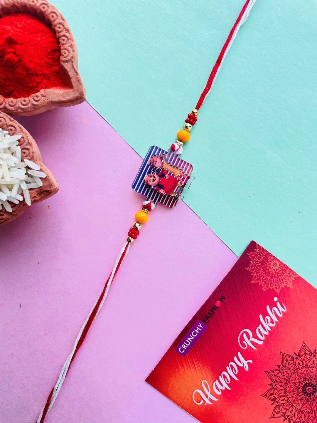 

Crunchy Fashion Boys Motu Patlu Wooden Rakhi, Red
