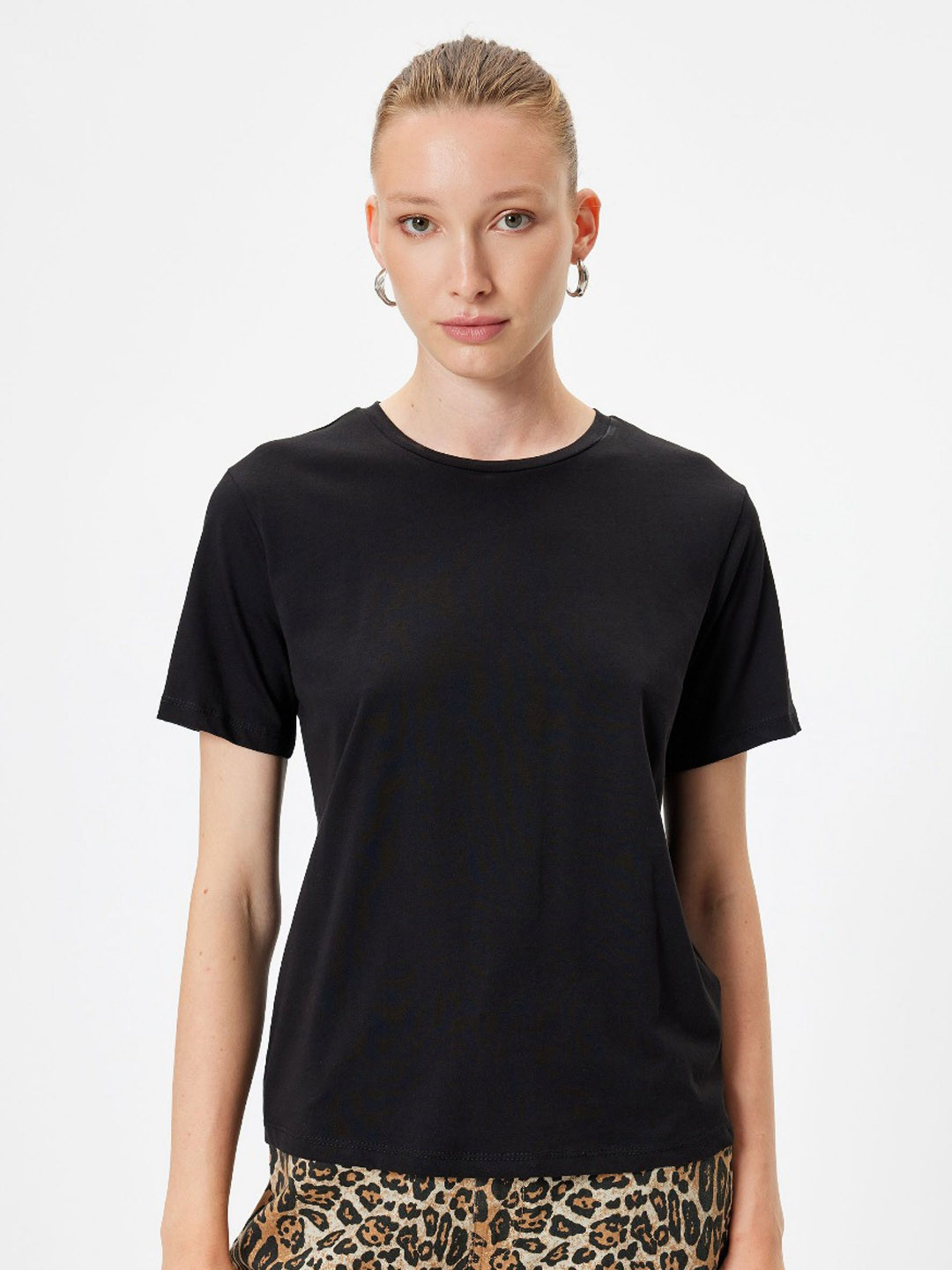 

Koton Women Solid Round Neck Cotton T-Shirt, Black