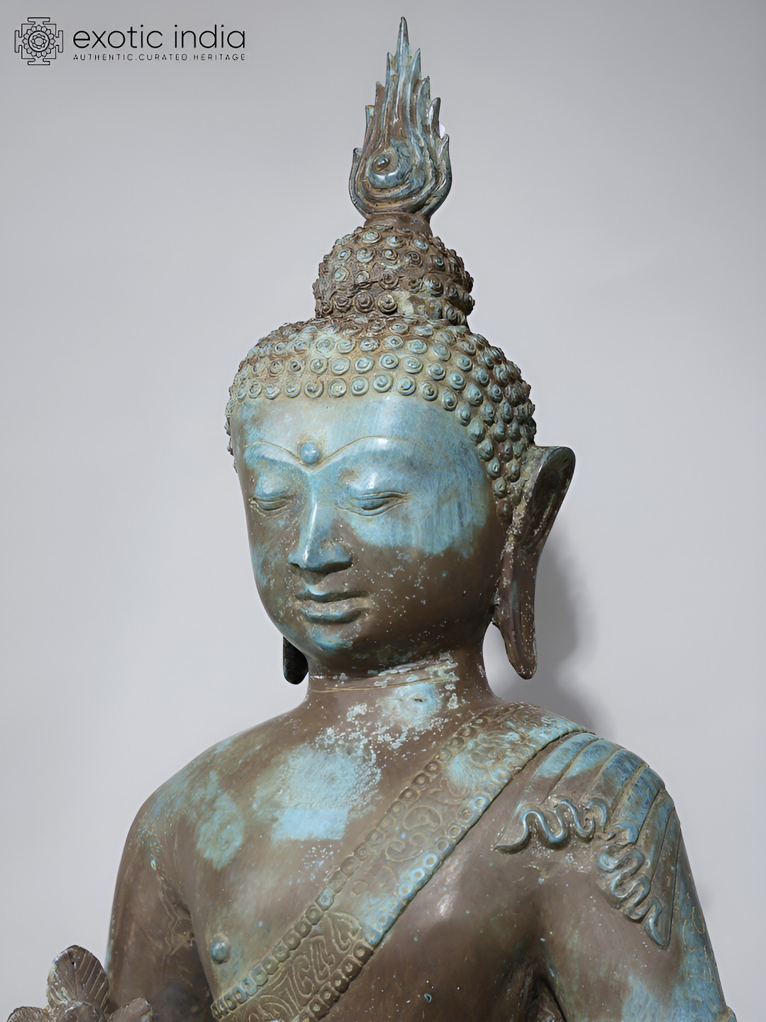 

Exotic India Brown & Blue Buddha Idol Showpiece