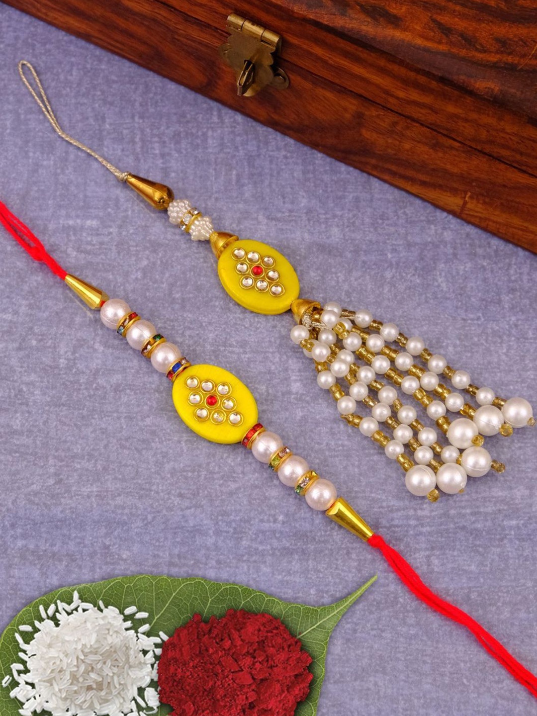 

Crunchy Fashion Kundan Studded & Beaded Bhaiya Bhabhi Thread Rakhi With Roli Chawal, Yellow