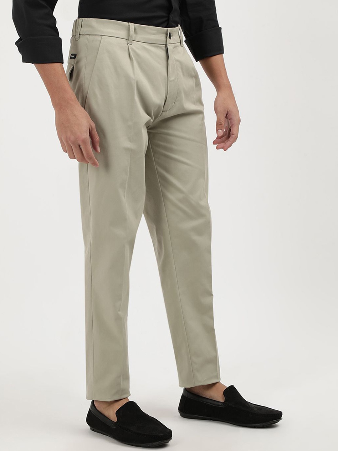 

Calvin Klein Jeans Men Tapered Fit Mid-Rise Flat-Front Trousers, Beige