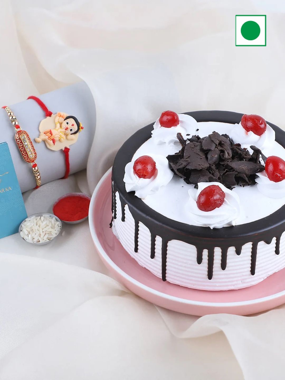 

fnp Rakhi & Black Forest Cake with Roli Chawal 1kg, Red