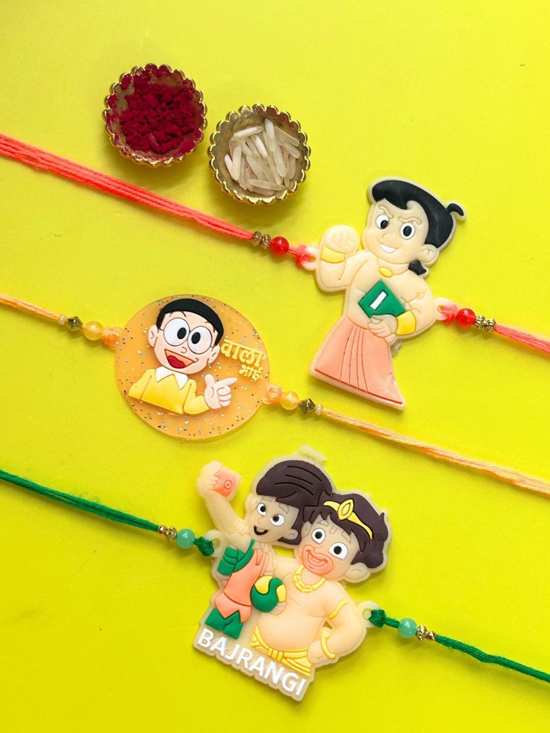 

LAIDA Kids Set Of 3 Bajrangi Chhota Bheem & Kulfi Wala Bhai Thread Rakhis With Roli Chawal, Yellow