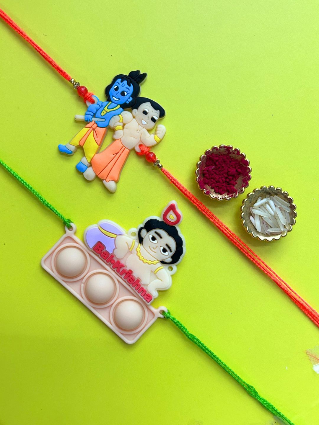 

LAIDA Kids Set Of 2 Balkrishna & Chhota Bheem Thread Rakhis With Roli Chawal, Orange