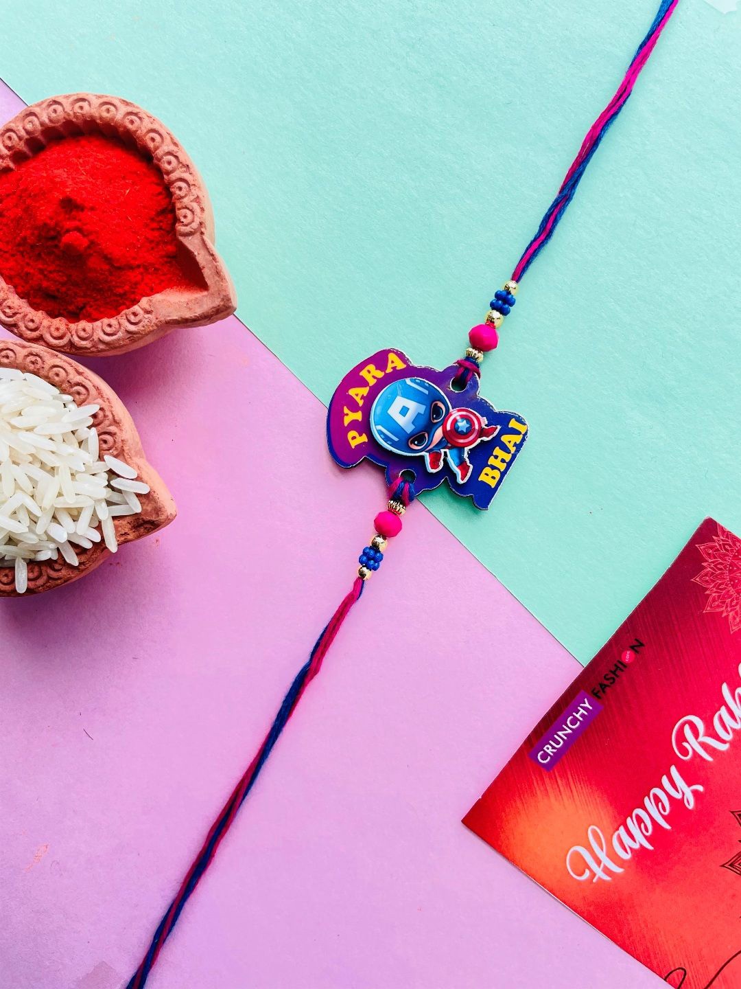 

Crunchy Fashion Beaded Thread Rakhi With Roli Chawal, Blue