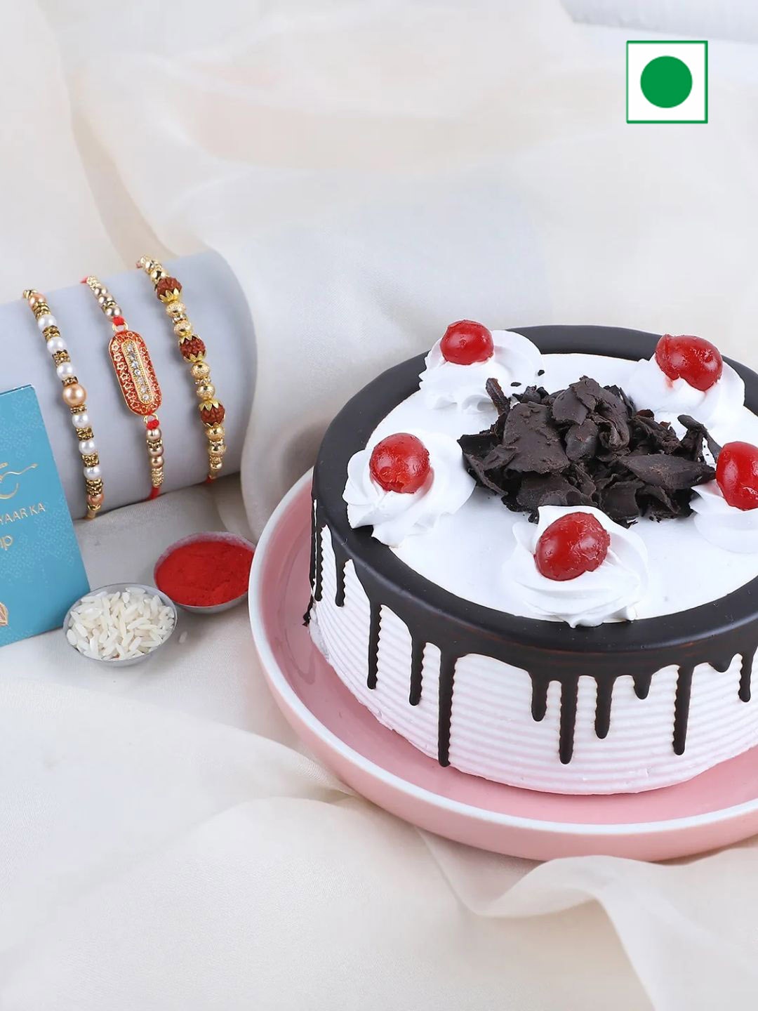 

fnp 3 Pcs Rakhi & Black Forest Cake with Roli and Chawal 500g, Gold