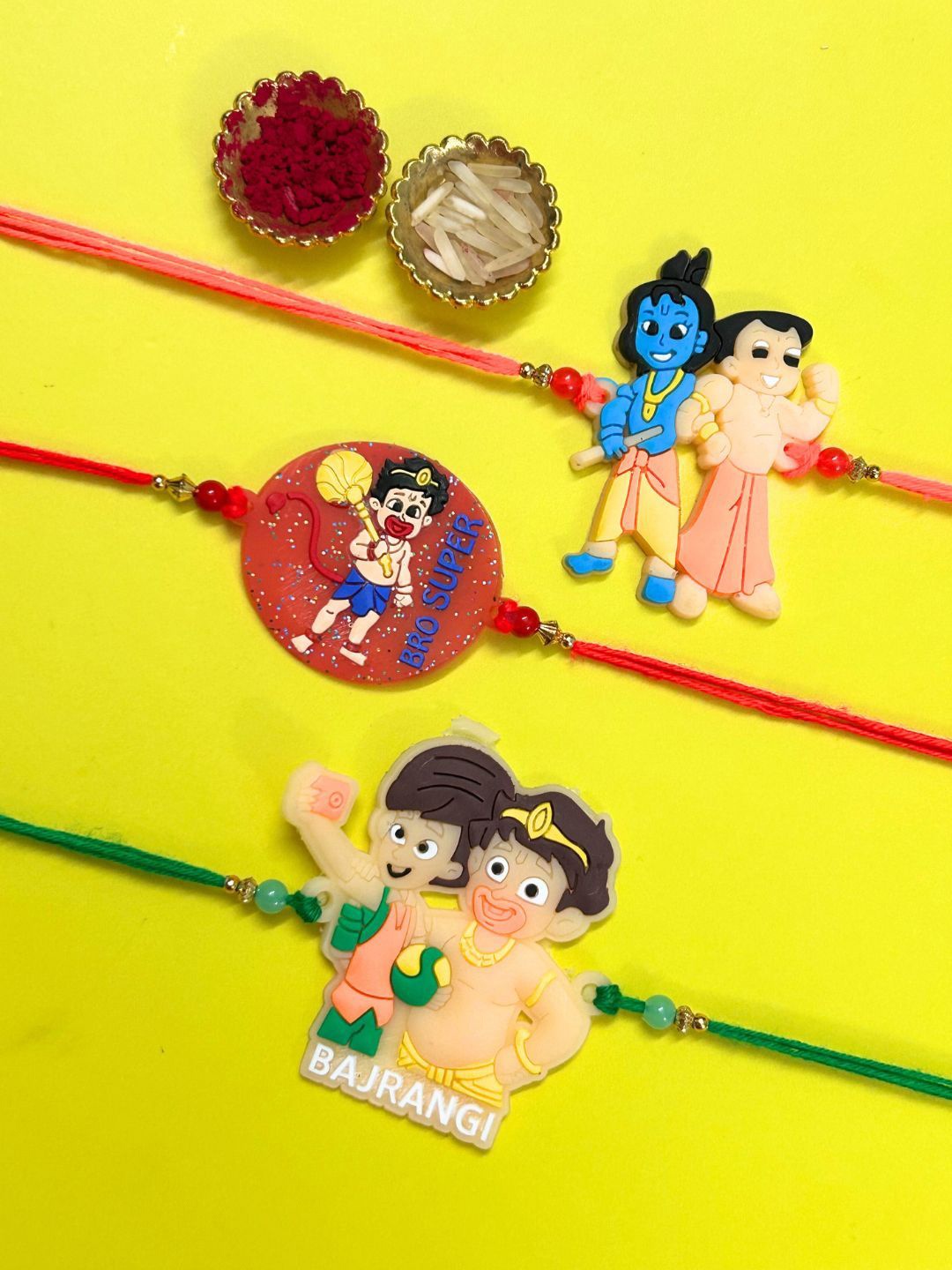 

LAIDA Kids Set Of 3 Bajrangi Chhota Bheem & Super Bro Bhai Thread Rakhis With Roli Chawal, Red