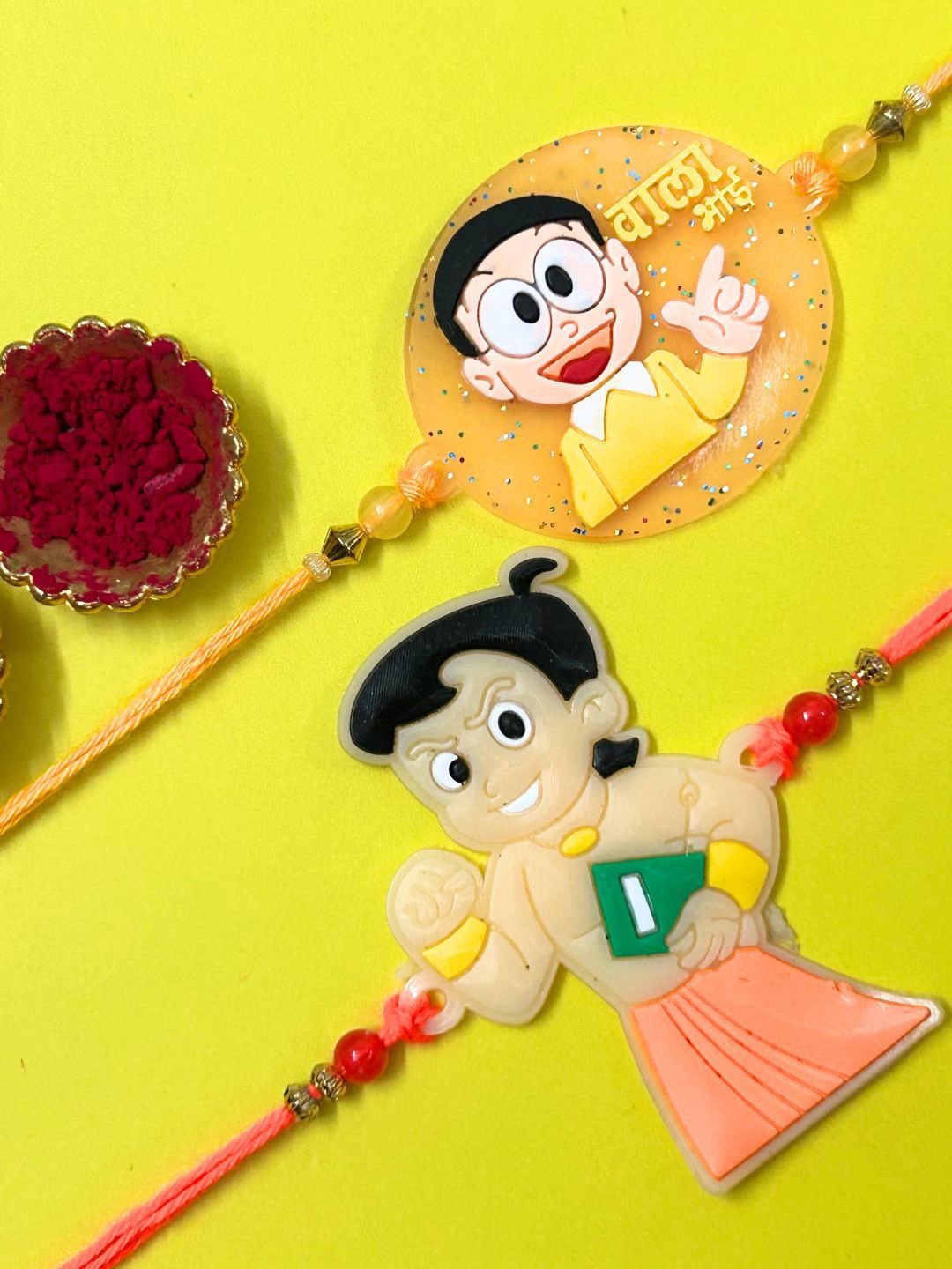 

LAIDA Kids Set Of 2 Chhota Bheem & Kulfi Wala Bhai Thread Rakhis With Roli Chawal, Orange