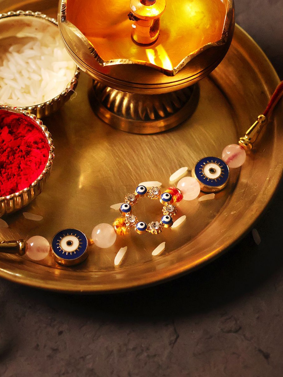 

Shubhanjali Evil Eye Thread Rakhis With Roli Chawal & Greeting Card, Blue