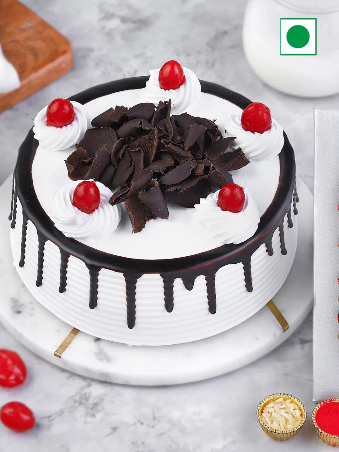 

fnp Rakhi & Black Forest Cake with Roli chawal gift set, Multi