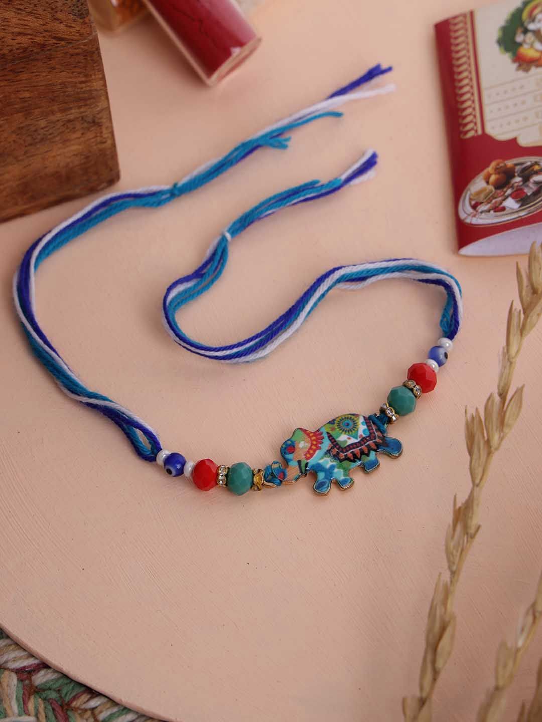 

PANASH Elephant Shaped Rakhi With Roli Chawal, Blue