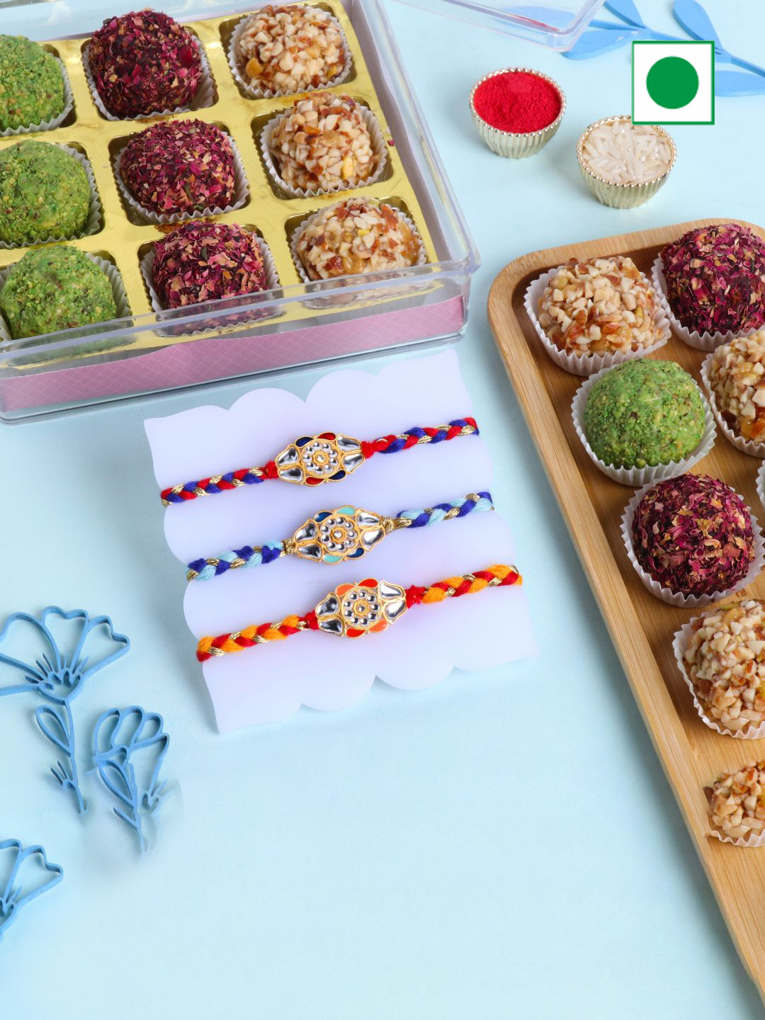 

Floweraura Set Of 3 Rakhis With 9Piece Mix Dryfruits Laddoo, Multi