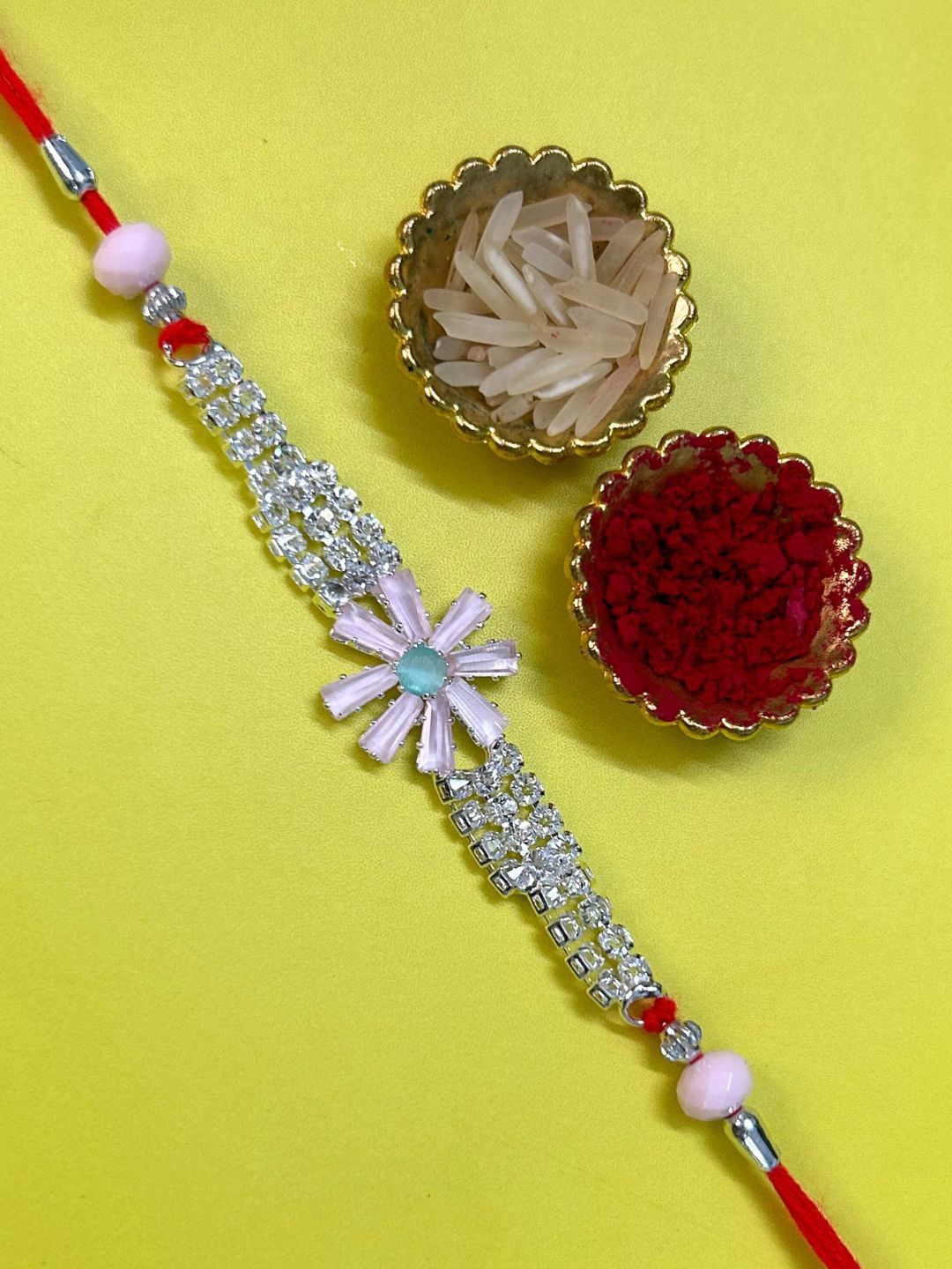

LAIDA Flower American Diamond Studded Thread Rakhi With Roli Chawal, Silver