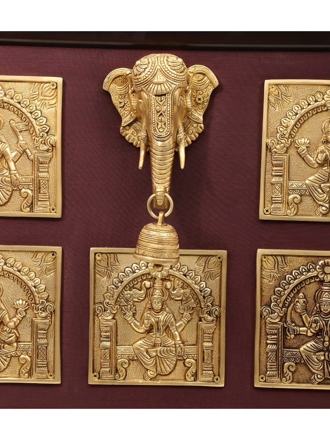 

Exotic India Gold-Toned Ashtalakshmi Panel & Miniscule Ganesha Head Idol Brass Showpiece