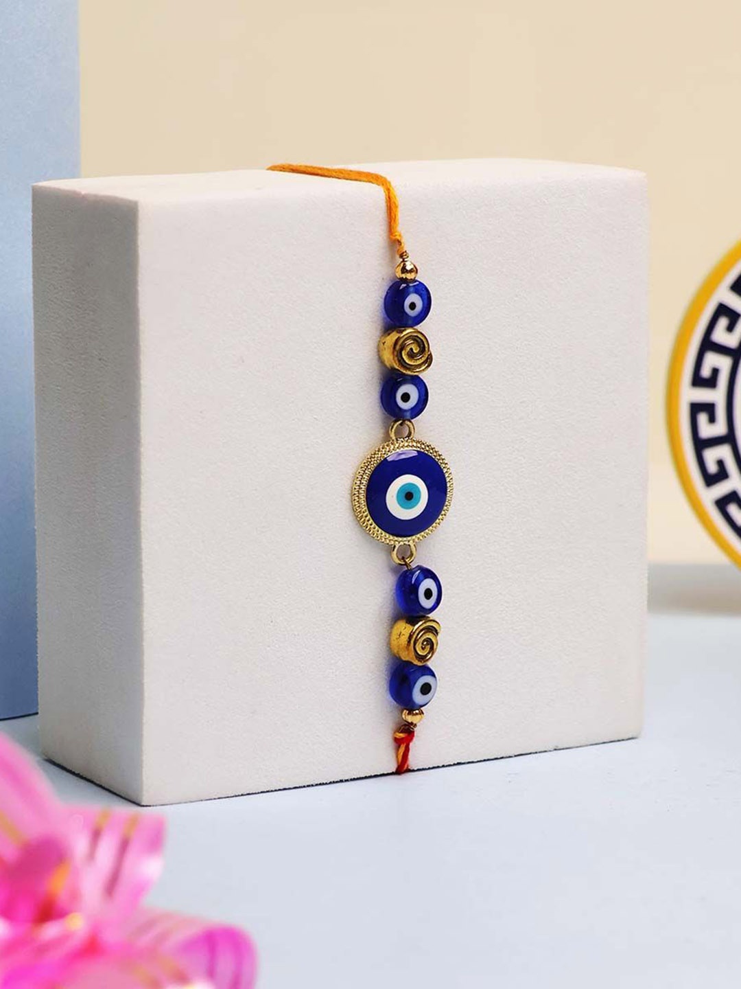 

Shubhanjali Evil Eye Big Round Thread Rakhis With Roli Chawal & Greeting Card, Blue