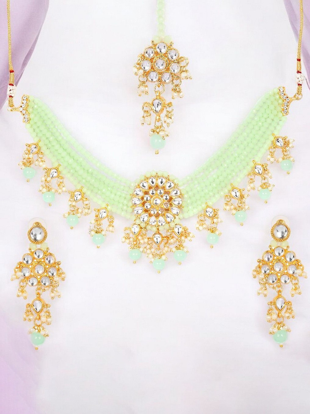 

Anouk Gold Toned Kundan Studded & Beaded Jewellery Set