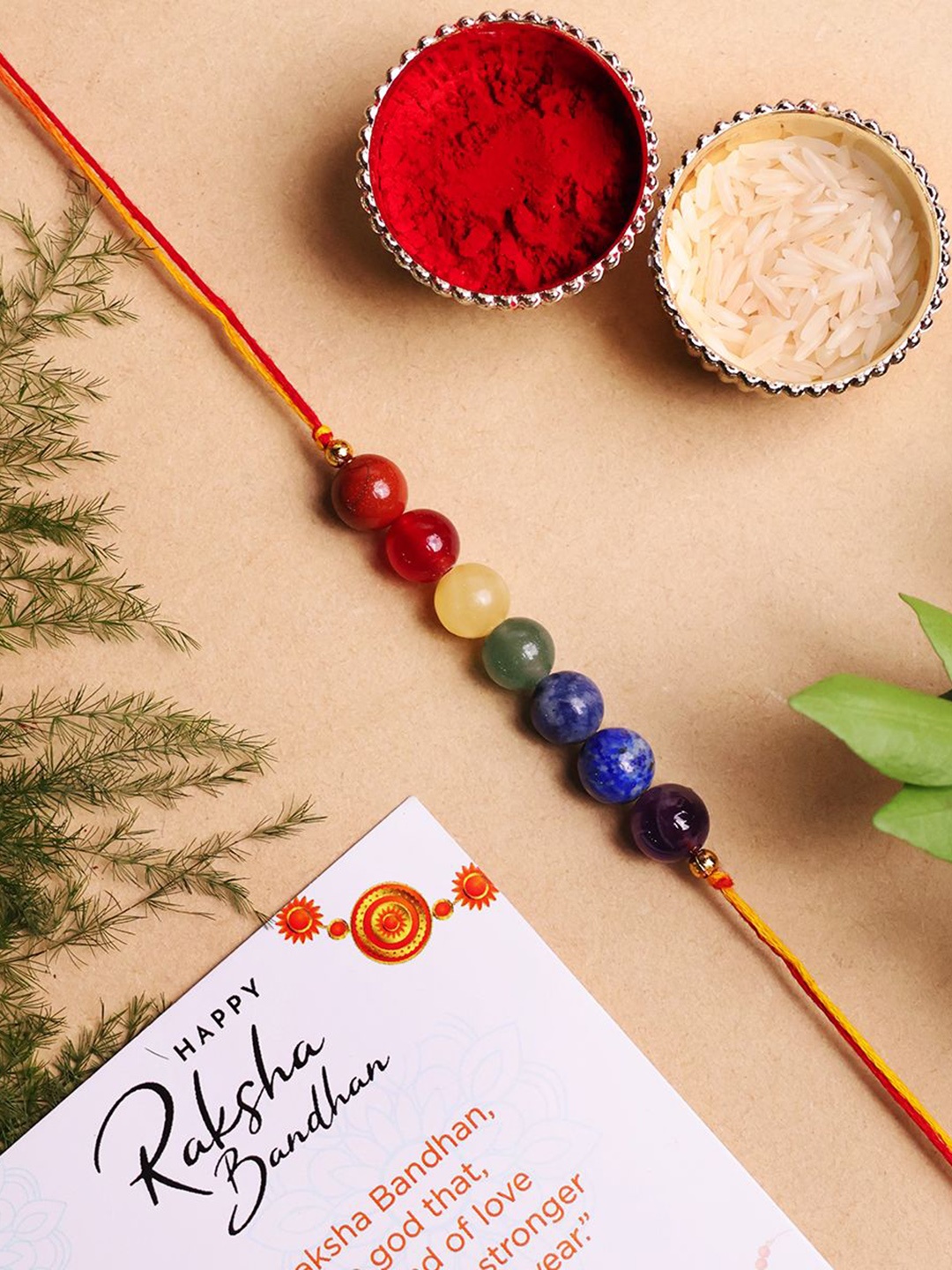 

Shubhanjali Set Of 2 Beaded 7 Chakra Rakhis With Roli Chawal & Greeting Card, Yellow