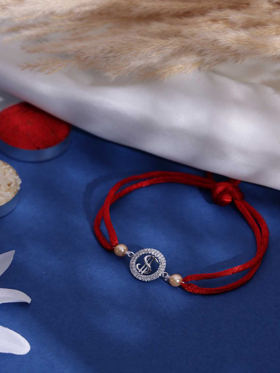 

PANASH- 925 Sterling Silver -Plated CZ Stone Studded Rakhi With Roli Chawal