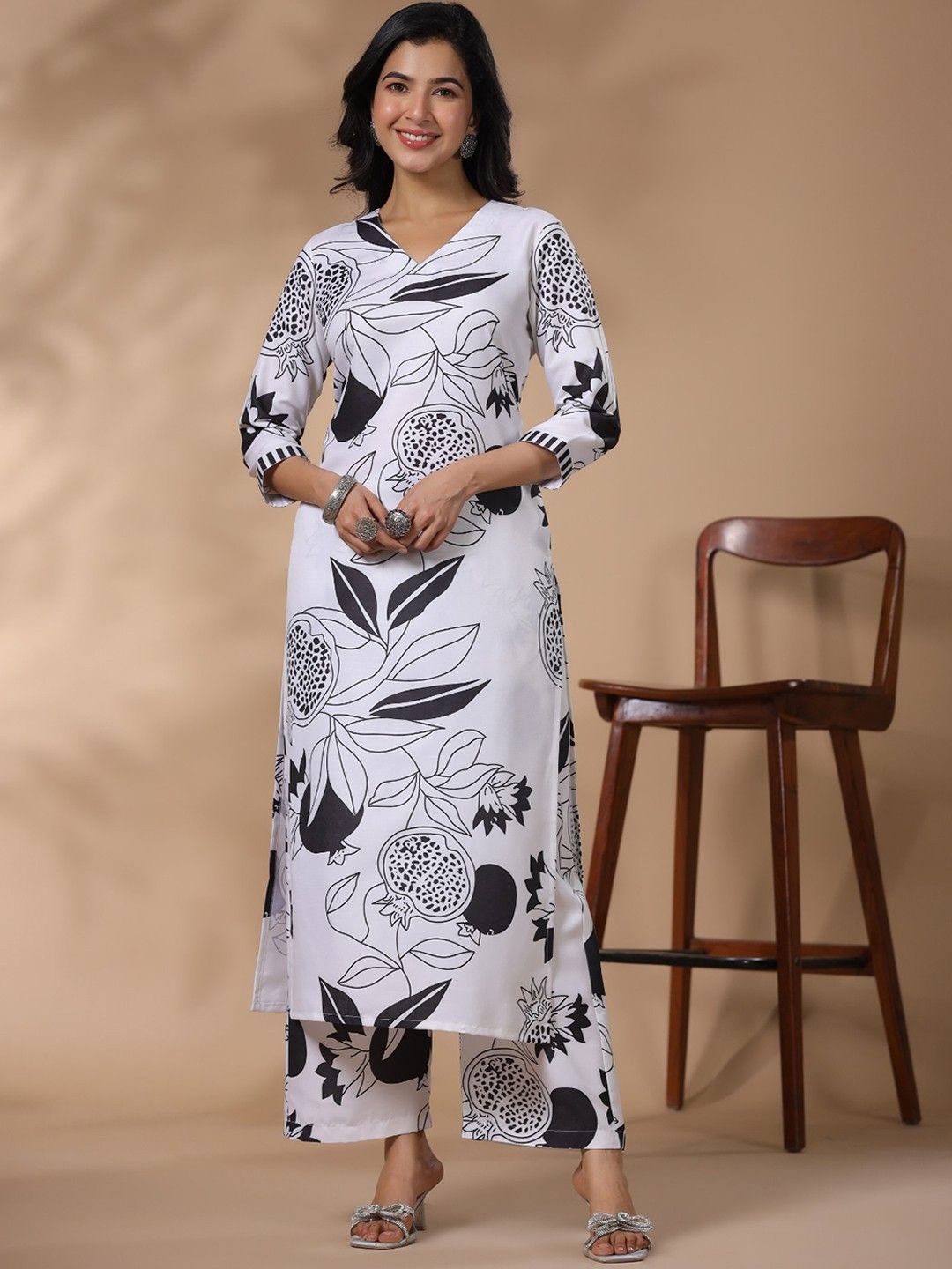 

KALINI Floral Printed V Neck Straight Kurta With Palazzos, Beige