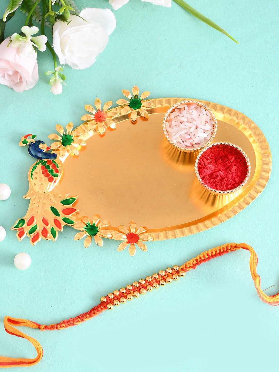 

Aapno Rajasthan Set of 2 Meenakari Beaded Rakhis With Pooja Thai And Roli Chawal, Red