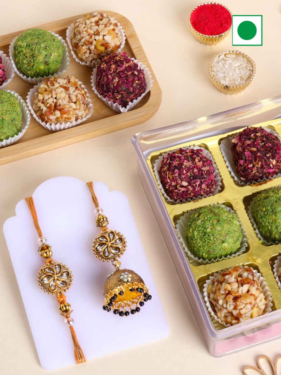 

Floweraura Set Of 2 Rakhis With 9Piece Mix Dryfruits Laddoo, Multi