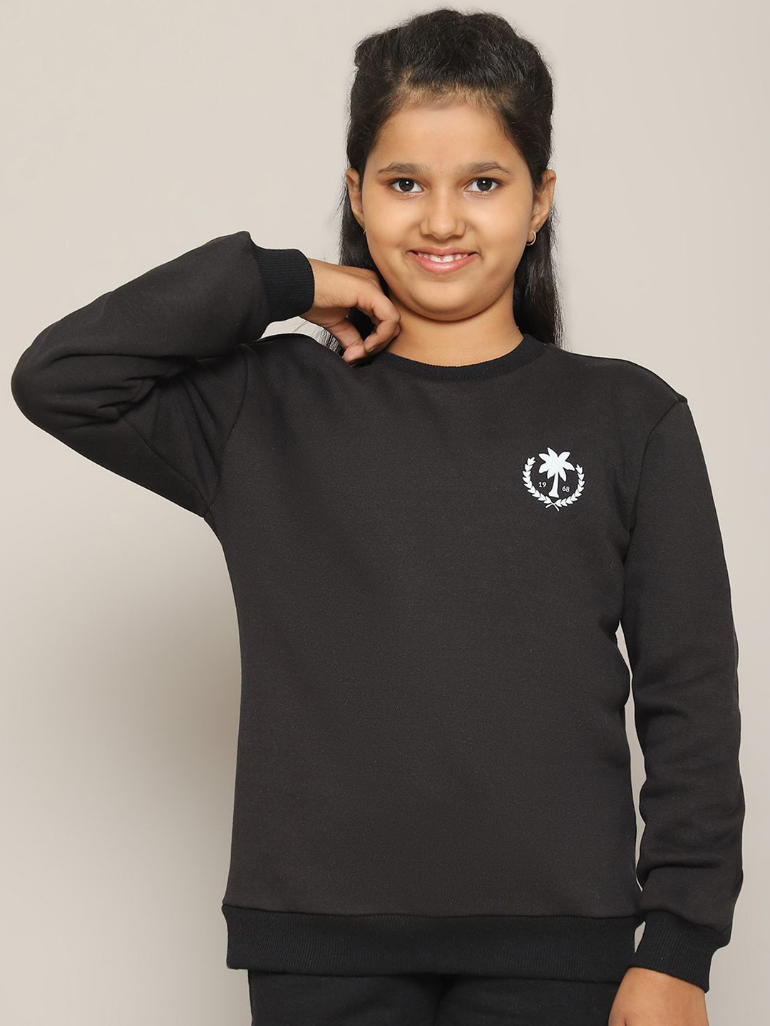 

Rute Girls Round Neck Full Sleeves Pullover Sweatshirt, Black