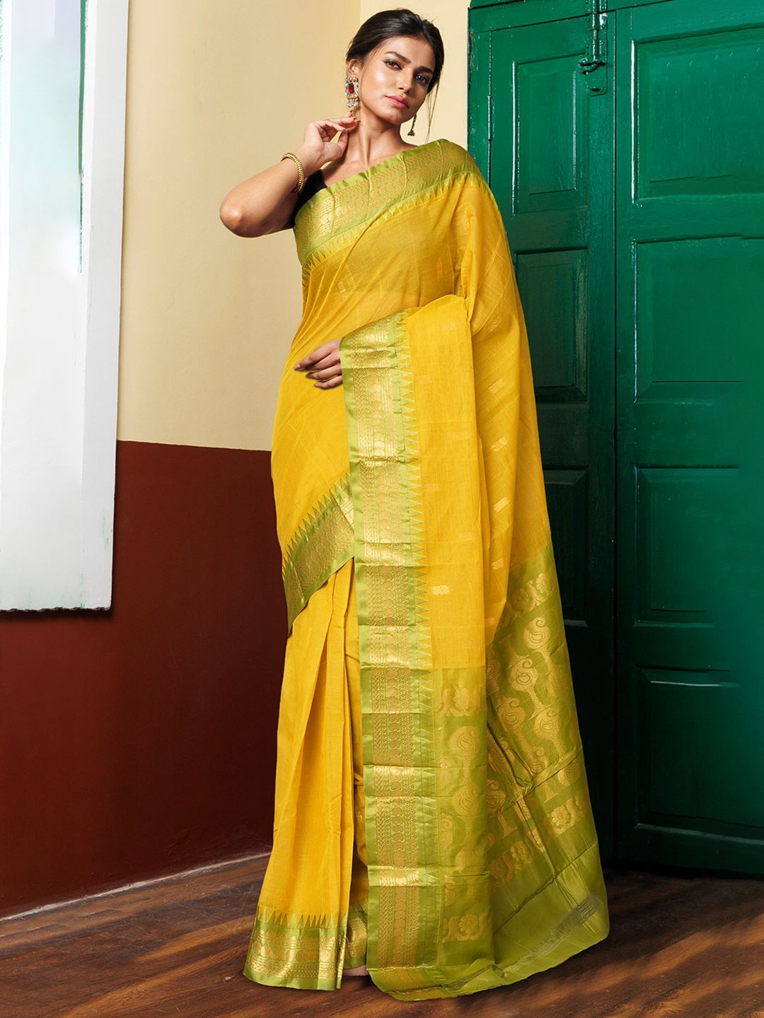 

Unnati Silks Woven Design Zari Pure Cotton Gadwal Saree, Yellow