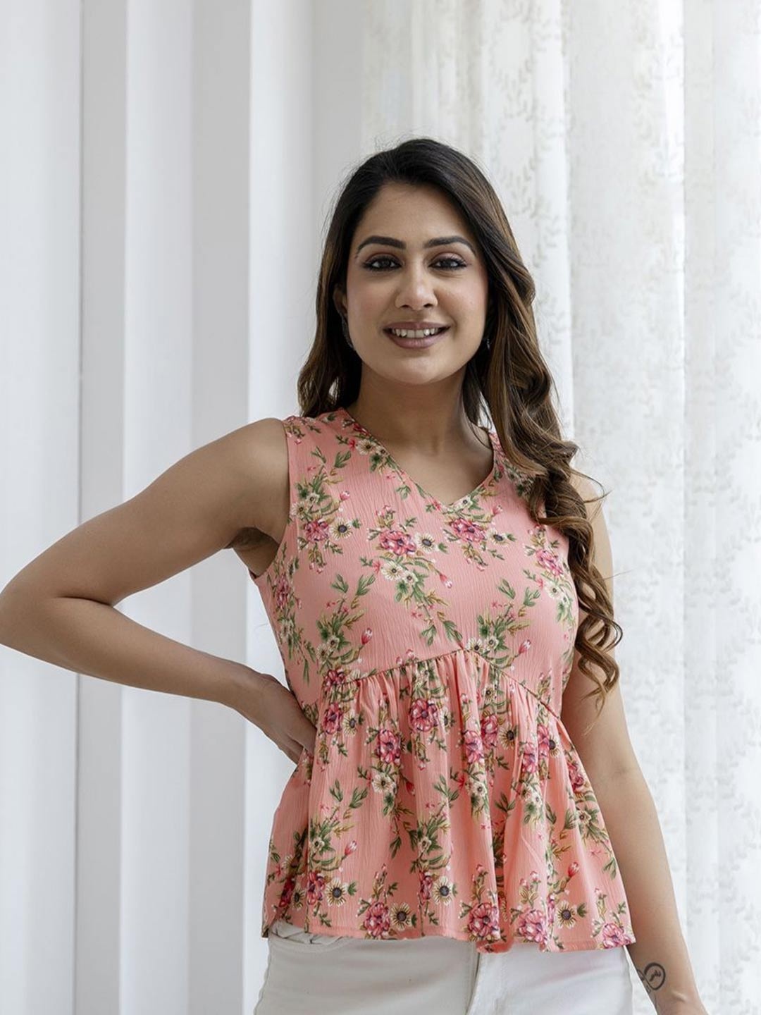 

Nayo Women Floral Printed Peplum Tunic, Peach