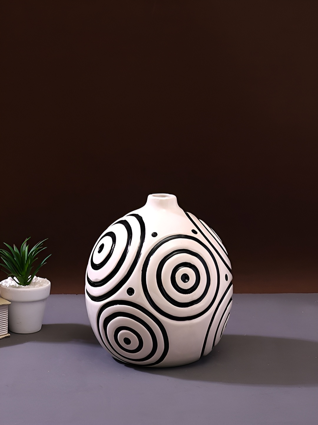 

TAYHAA White & Black Geometric Printed Circular shaped Ceramic Flower Vase