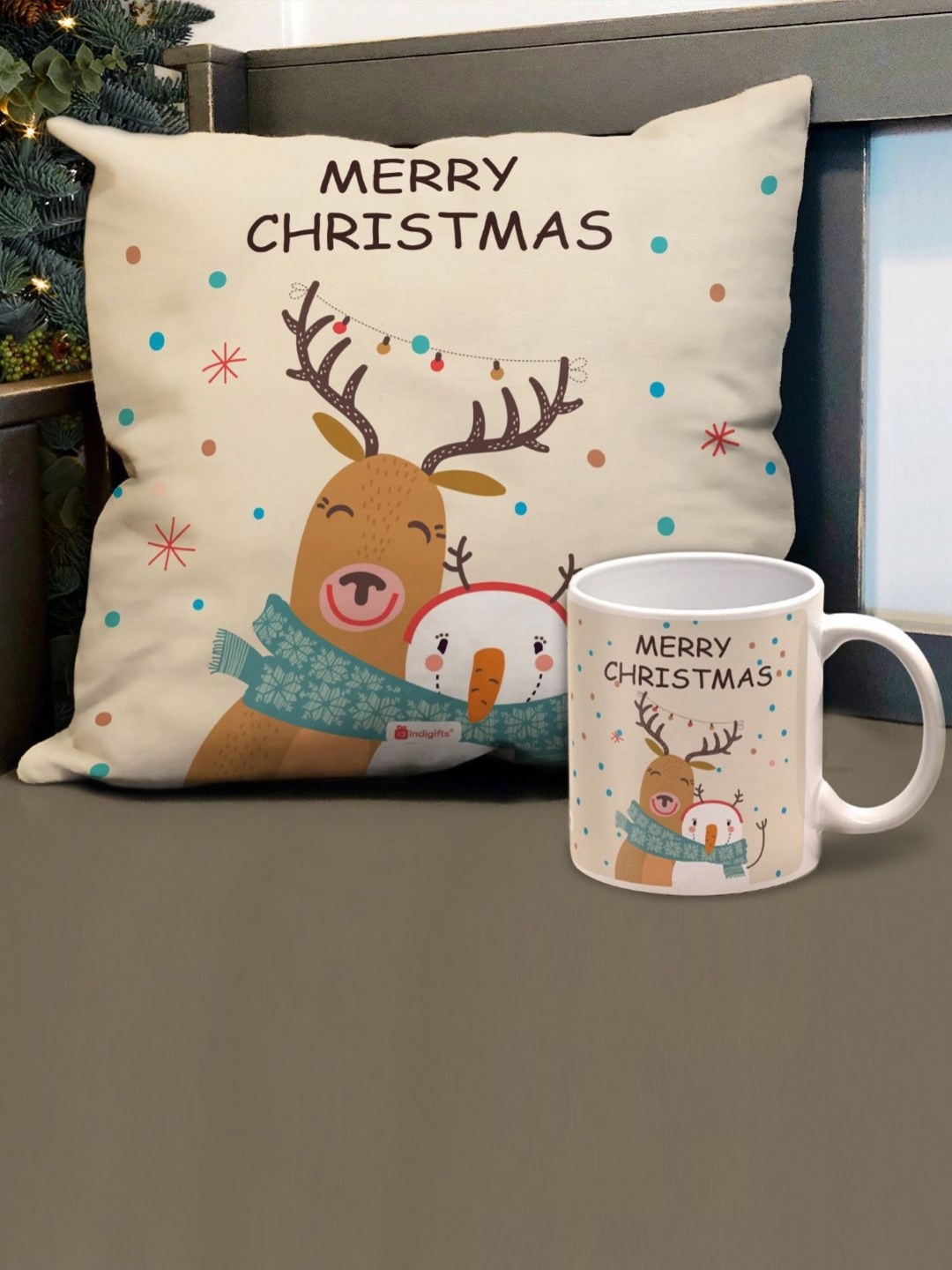 

Indigifts 2-Pcs Beige & White Christmas Printed Cushion Cover With Filler & Coffee Mug
