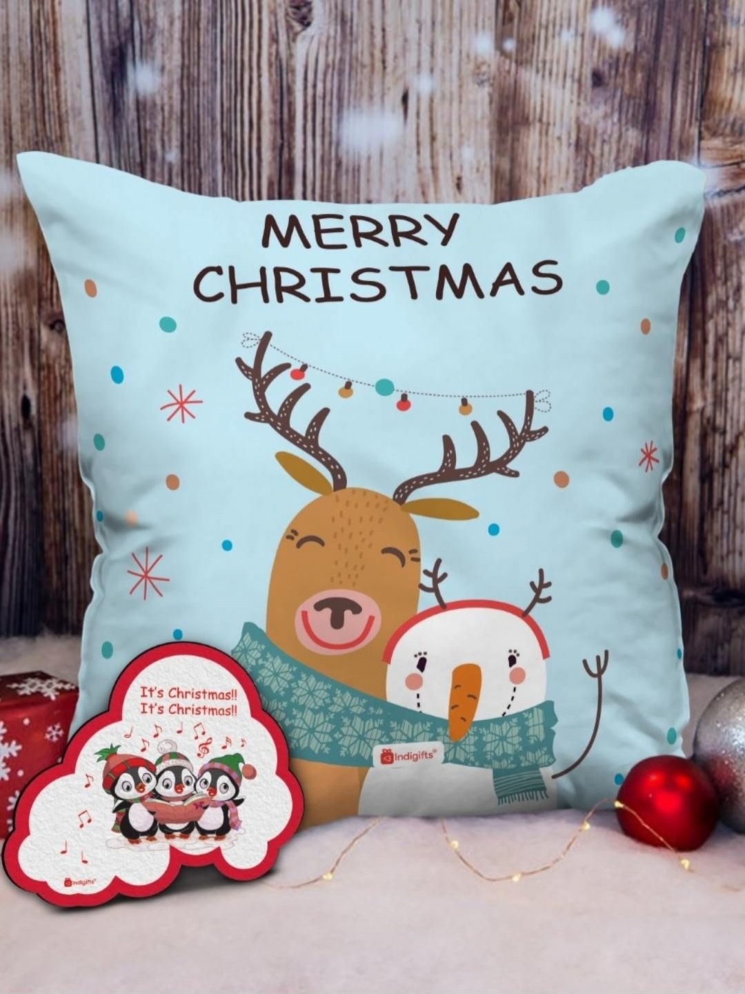 

Indigifts Blue & Red 2 Pieces Merry Christmas Printed Cushion & Fridge Magnet