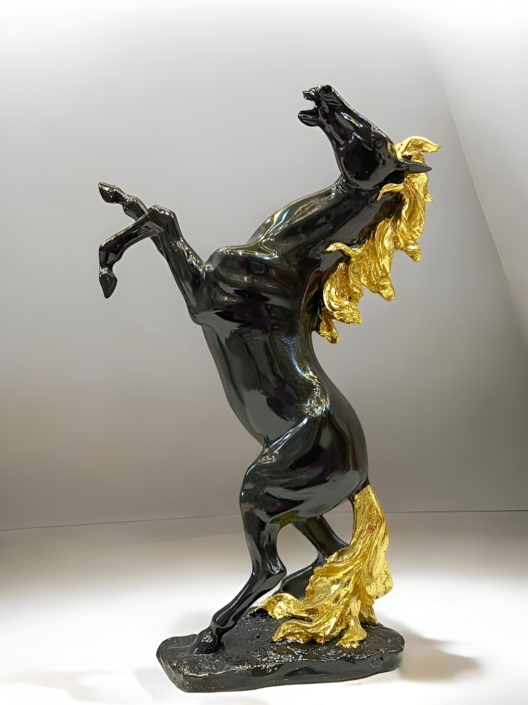 

NAYRA HANDICRAFTS Black & Gold Toned Horse Shaped Figurine Showpiece