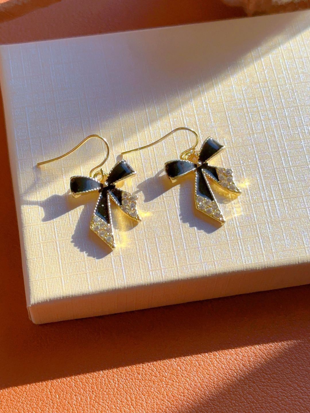 

DressBerry Stainless Steel Gold Plated Contemporary Drop Earrings, Black