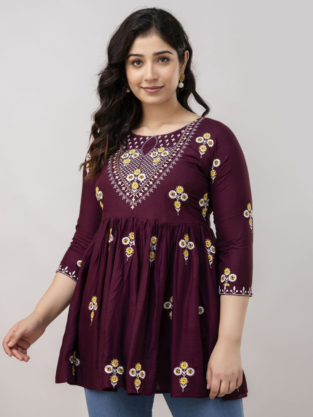 

Ksharaa Women Ethnic Motifs Embroidered Round Neck Longline Peplum Top, Maroon
