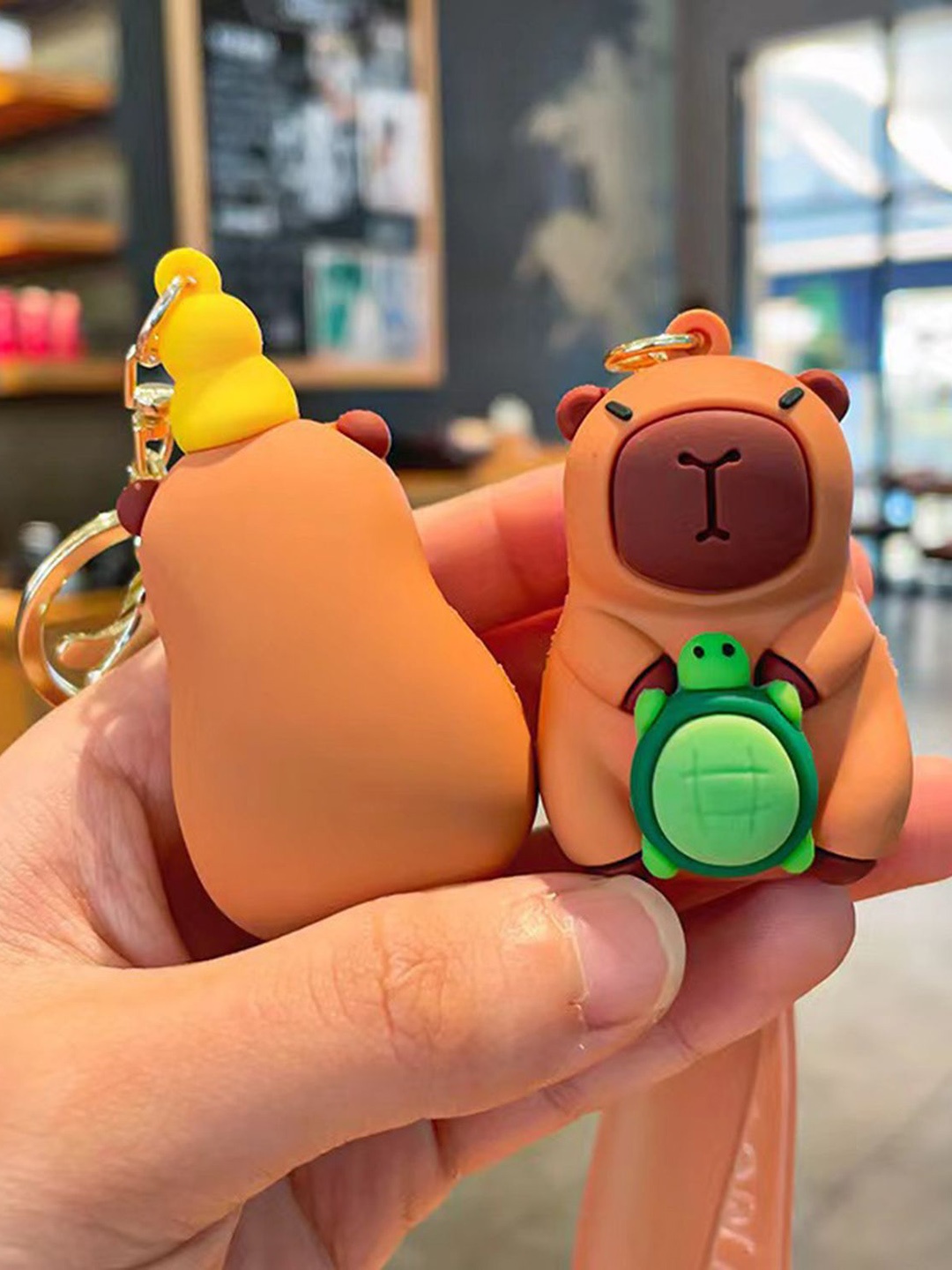 

Flenzy Capybara Doll keychain With Silicone Belt, Brown