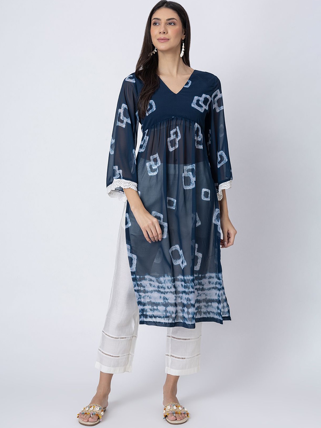 

Moomaya V-Neck Geometric Tie- Dye Pleated A-Line Kurta with Trousers, Teal