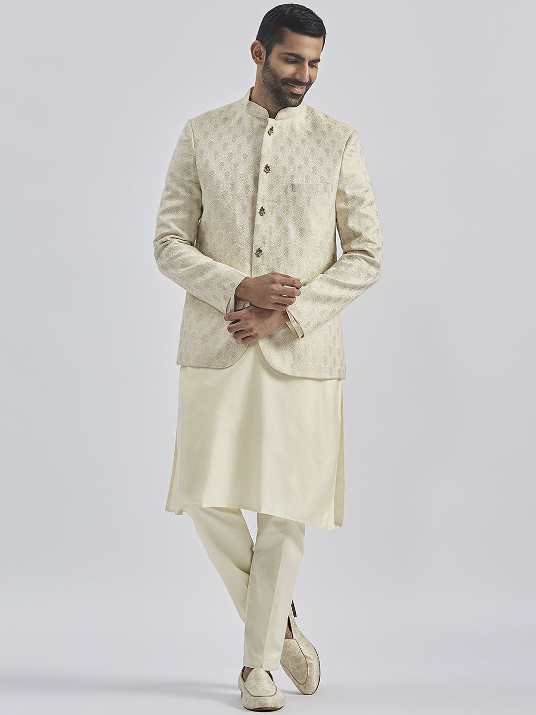 

VASTRAMAY Mandarin Collar Jacquard Weave Straight Kurta with Trousers & Bandhgala Jacket, Cream