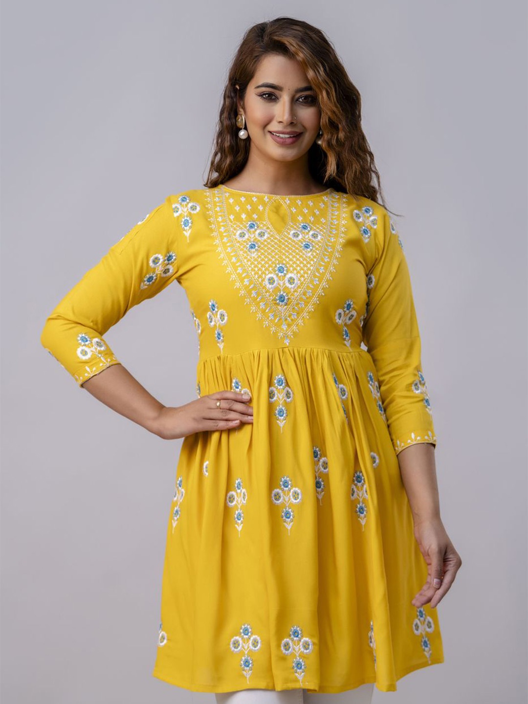 

Ksharaa Embroidered A-Line Top, Yellow