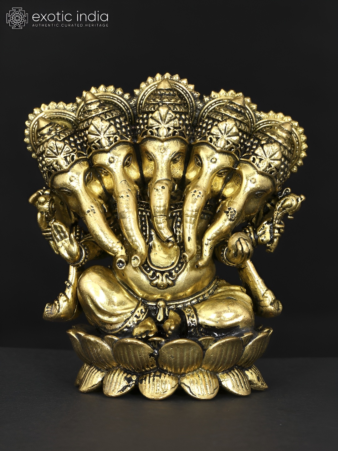 

Exotic India Gold-Toned Panchamukhi Lord Ganesha Seated on Lotus Religious Idol Showpiece