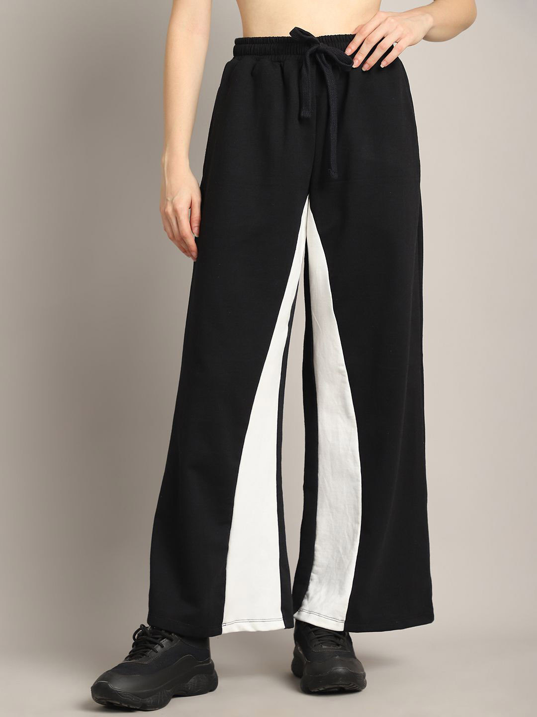 

Rute Women Cotton Colourblocked Loose Fit Pleated Bootcut Trousers, Black