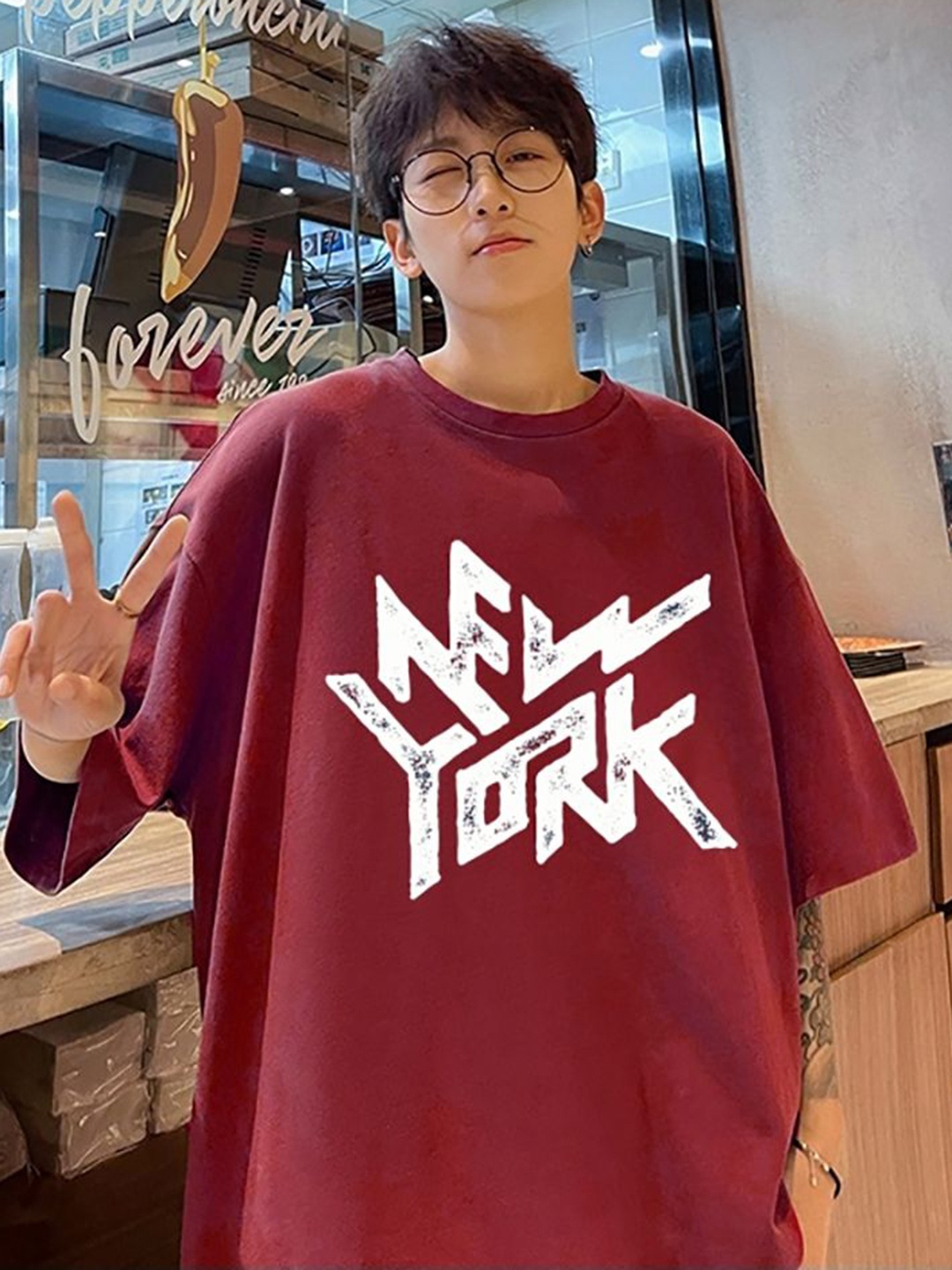 

StyleCast x Revolte Men Typography Printed Round Neck Oversized T-shirt, Maroon