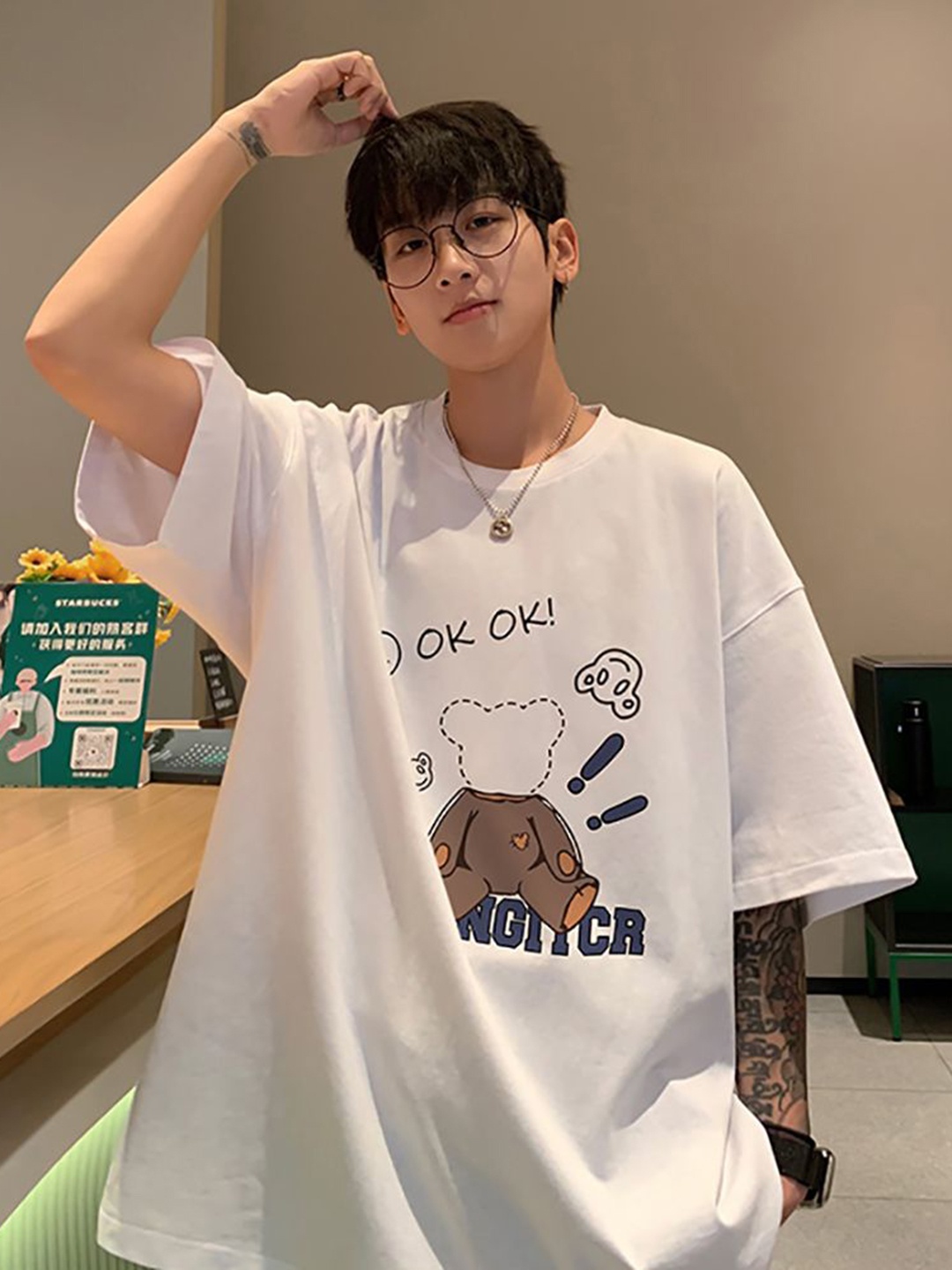 

StyleCast x Revolte Men Graphic Printed Round Neck Cotton Oversized T-shirt, White