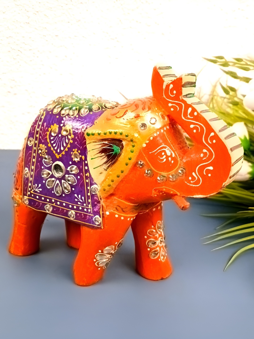 

apka mart Orange Figurine Showpiece